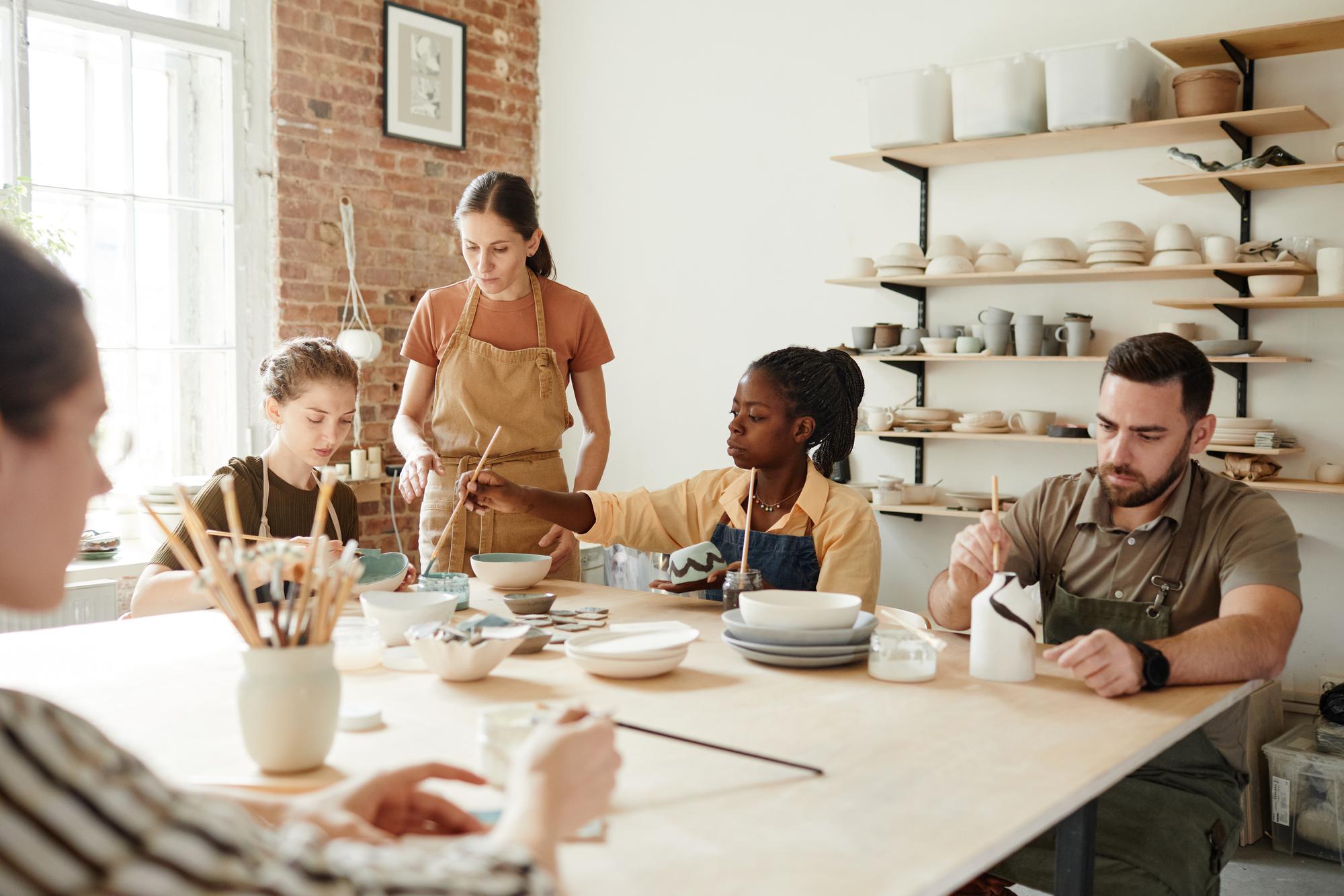 Cozy workshop room with a long communal table